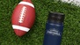 16 oz water bottle on field with football logo