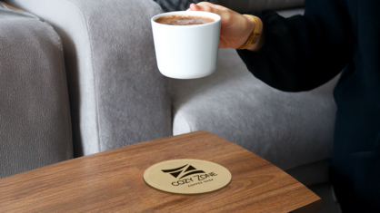 Custom engraved coaster for a coffee shop