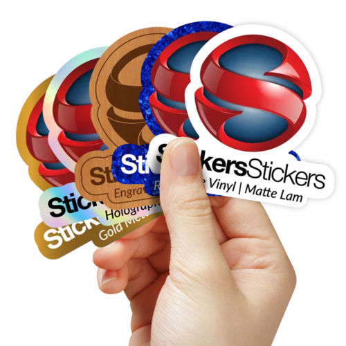 A hand holding 5 sample stickers printed on different materials.
